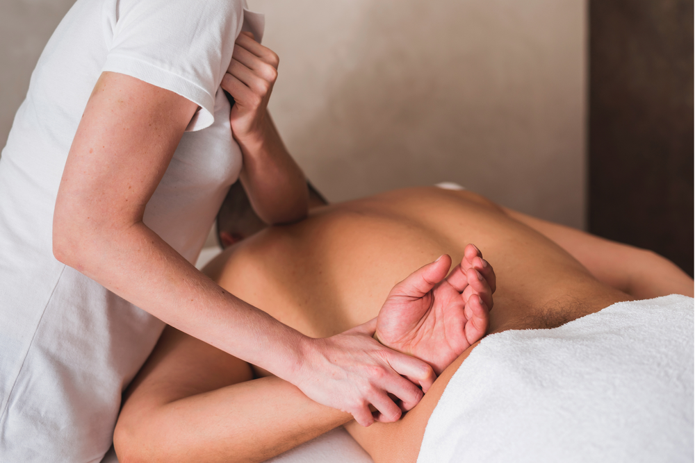 Athlete receiving a targeted sports massage at New Beginnings in Wyomissing, PA